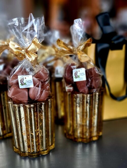 Photophore or paillette et ses pralines